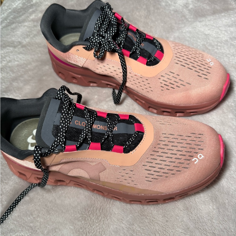 On Running Pink and Black Athletic Shoes with Unique Lacing System